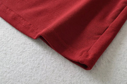 A long shirt with an opening at the neckline and a built-in bra