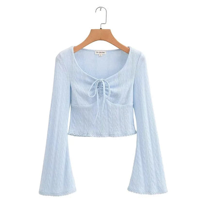 Aesthetic shirt with a tie in the chest and lace decorations