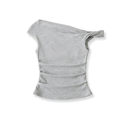 A shirt with a falling shoulder and shirring at the waist