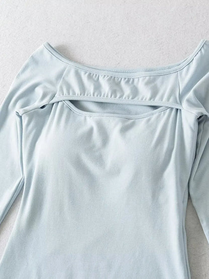 A long shirt with an opening at the neckline and a built-in bra