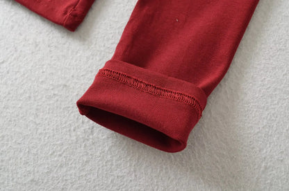 A long shirt with an opening at the neckline and a built-in bra