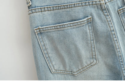 Flared jeans with rips at the knees