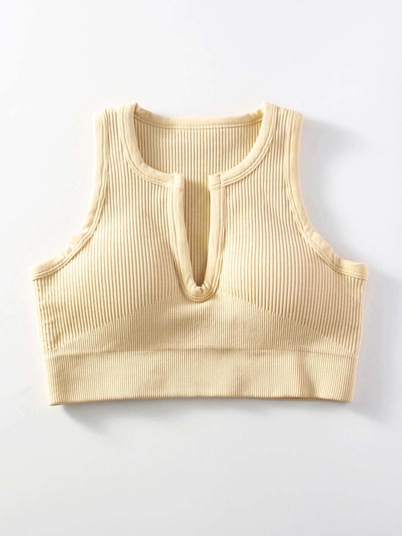 Sports bra with cleavage opening