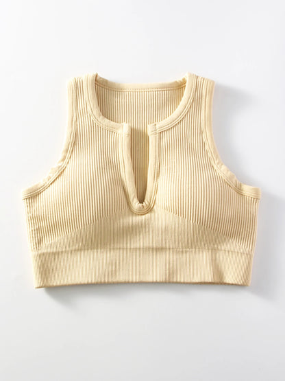 Sports bra with cleavage opening