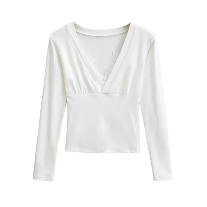 A long shirt with a neckline and protruding lace