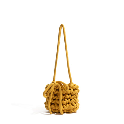 Soft knitted bag with bow tie