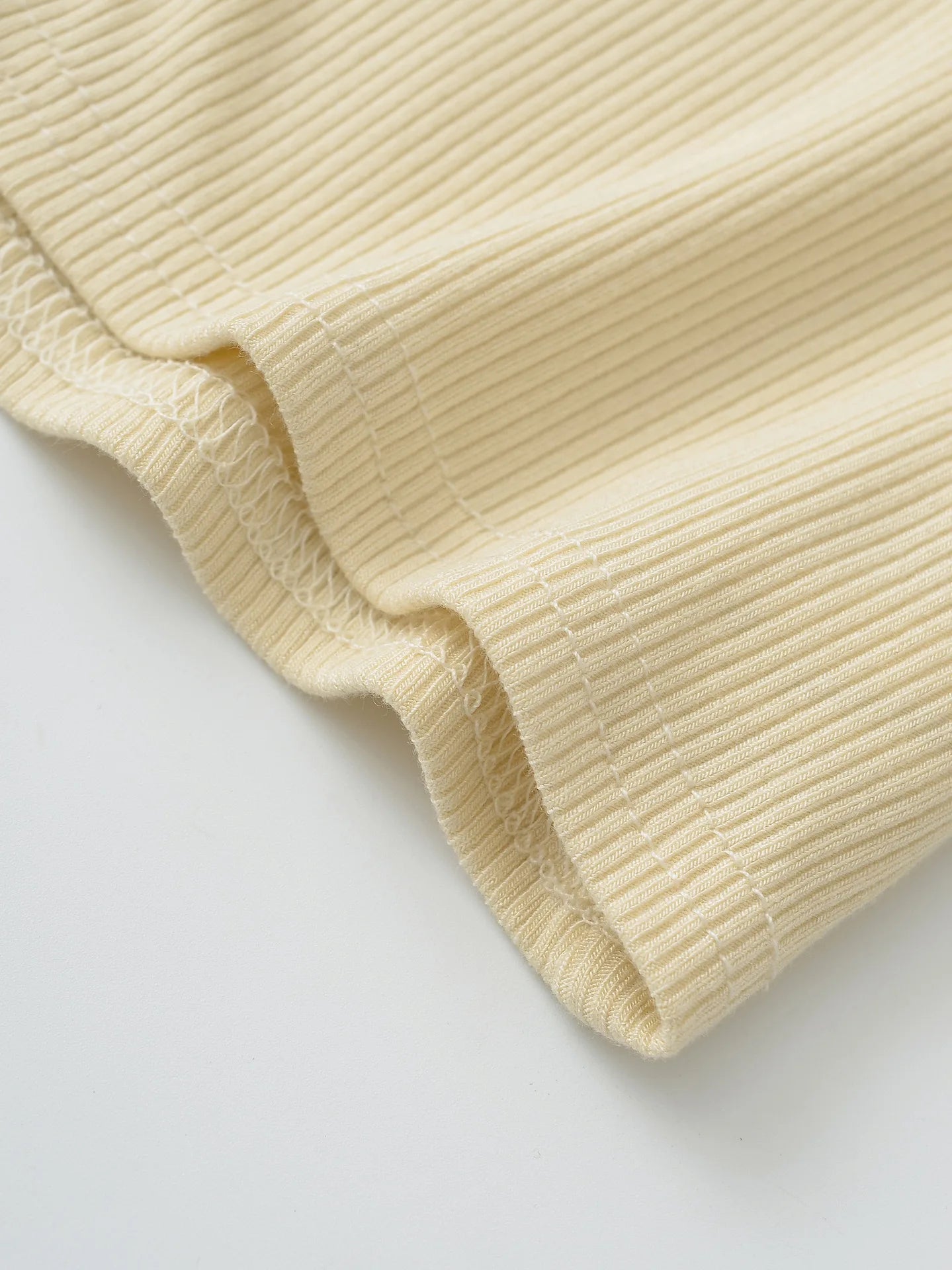 Buttoned collar tank top with a built-in bra