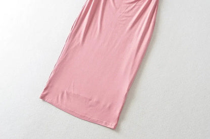 Collared dress with pleats at the waist