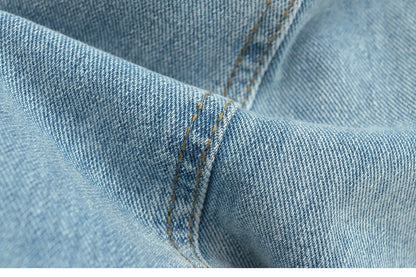 Flared jeans with rips at the knees