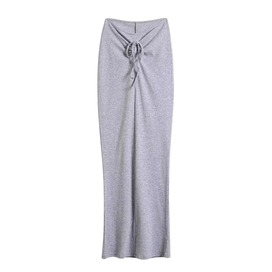A tight long skirt with a gathered buttock and a front tie