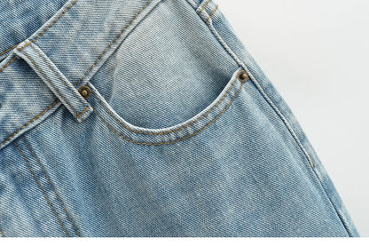 Flared jeans with rips at the knees