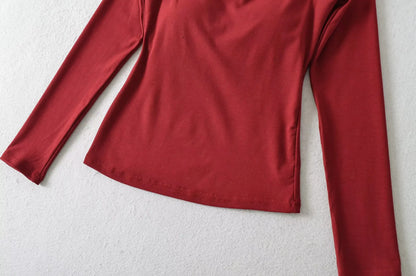 A long shirt with an opening at the neckline and a built-in bra