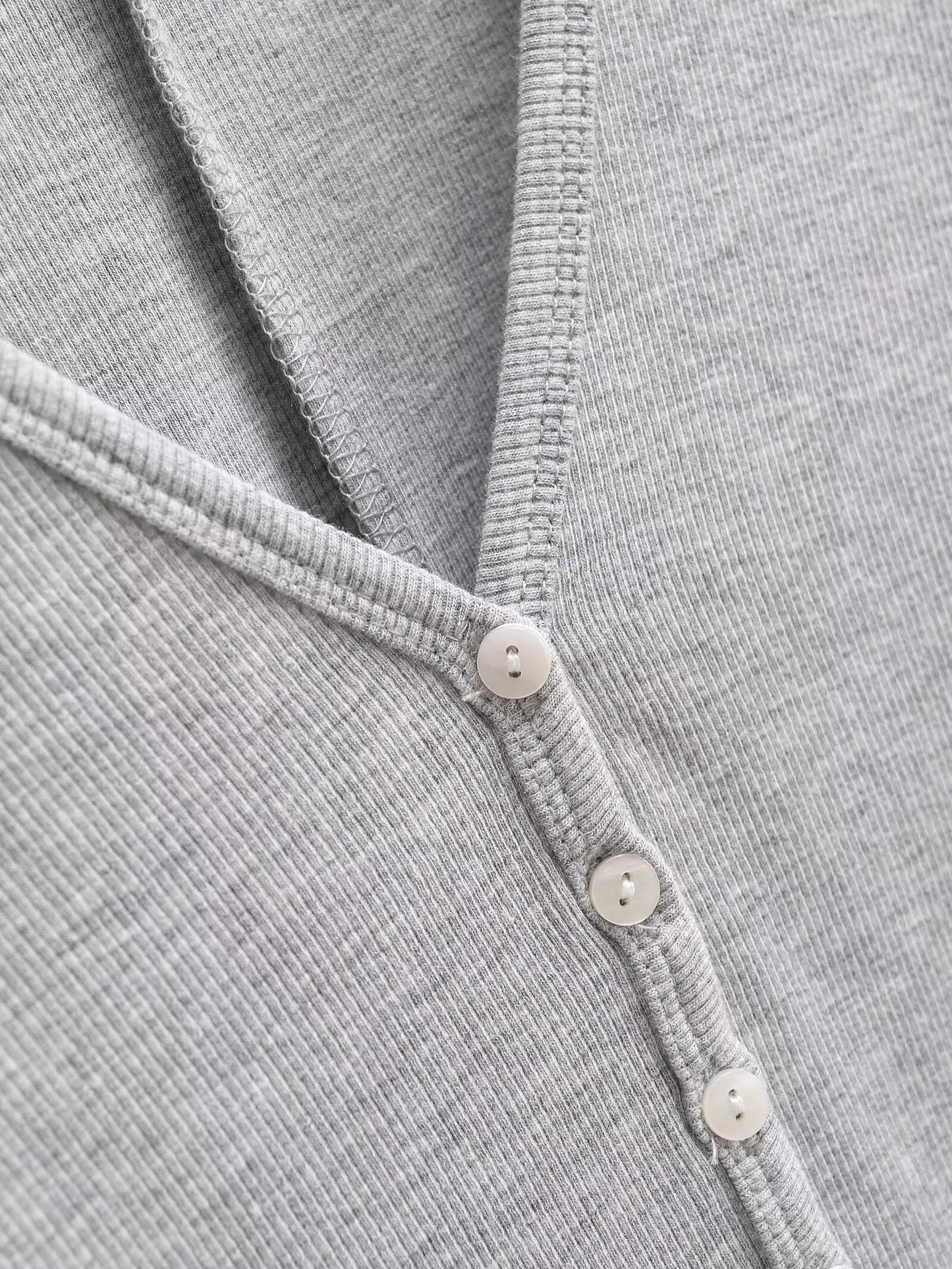 Buttoned v-neck overall