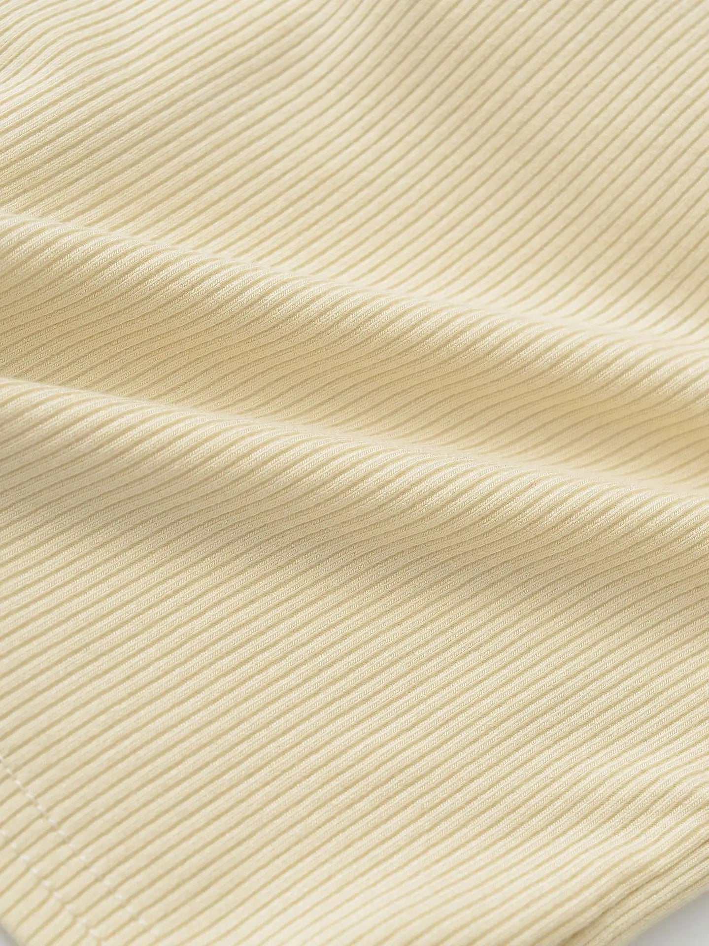 Buttoned collar tank top with a built-in bra