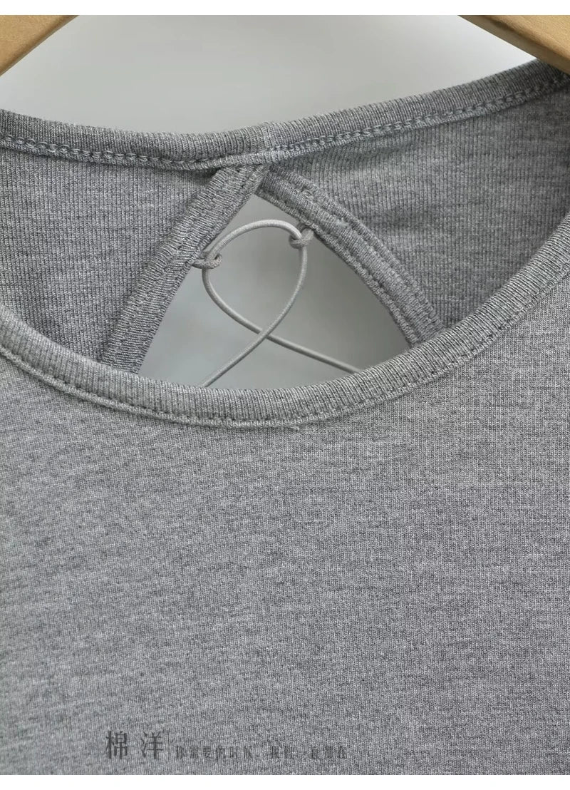 A dress with a built-in bra and an open back
