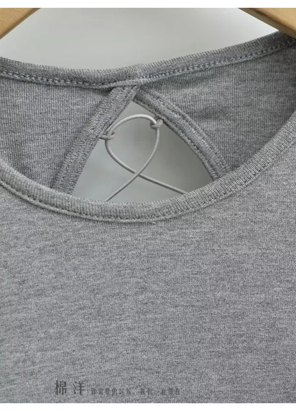 A dress with a built-in bra and an open back
