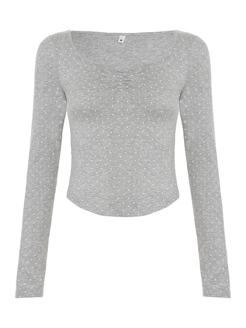 Shirt from a long point with contractions at the neckline