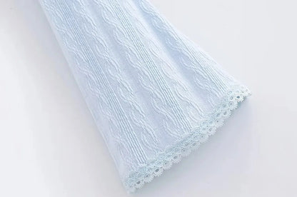 Aesthetic shirt with a tie in the chest and lace decorations