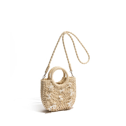 Side straw bag with bow ties