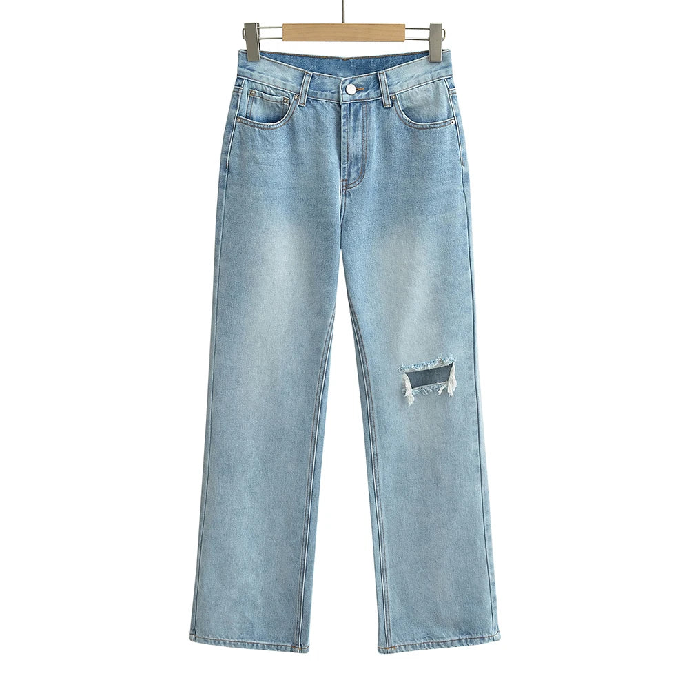Jeans with a tear in the knee