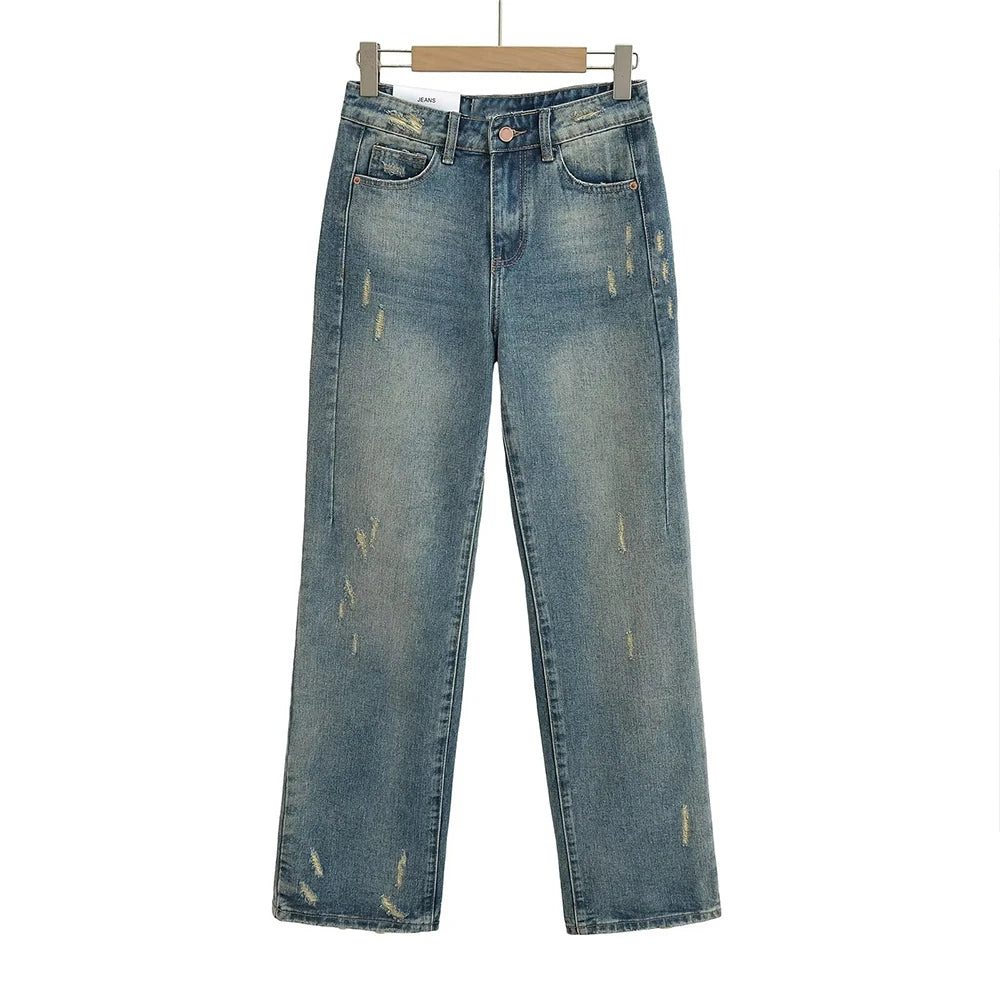 Straight jeans with a few tears