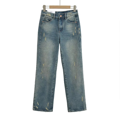Straight jeans with a few tears