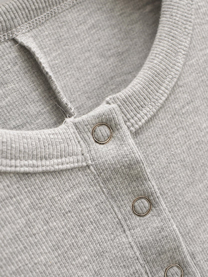 Tight overall with Tic Tac buttons