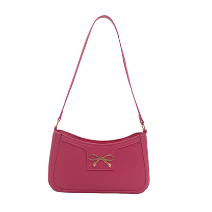 Shoulder bag with gold bow