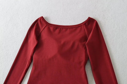 A long shirt with an opening at the neckline and a built-in bra