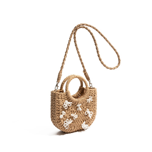 Side straw bag with bow ties