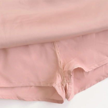 Low mini skirt with built-in tights