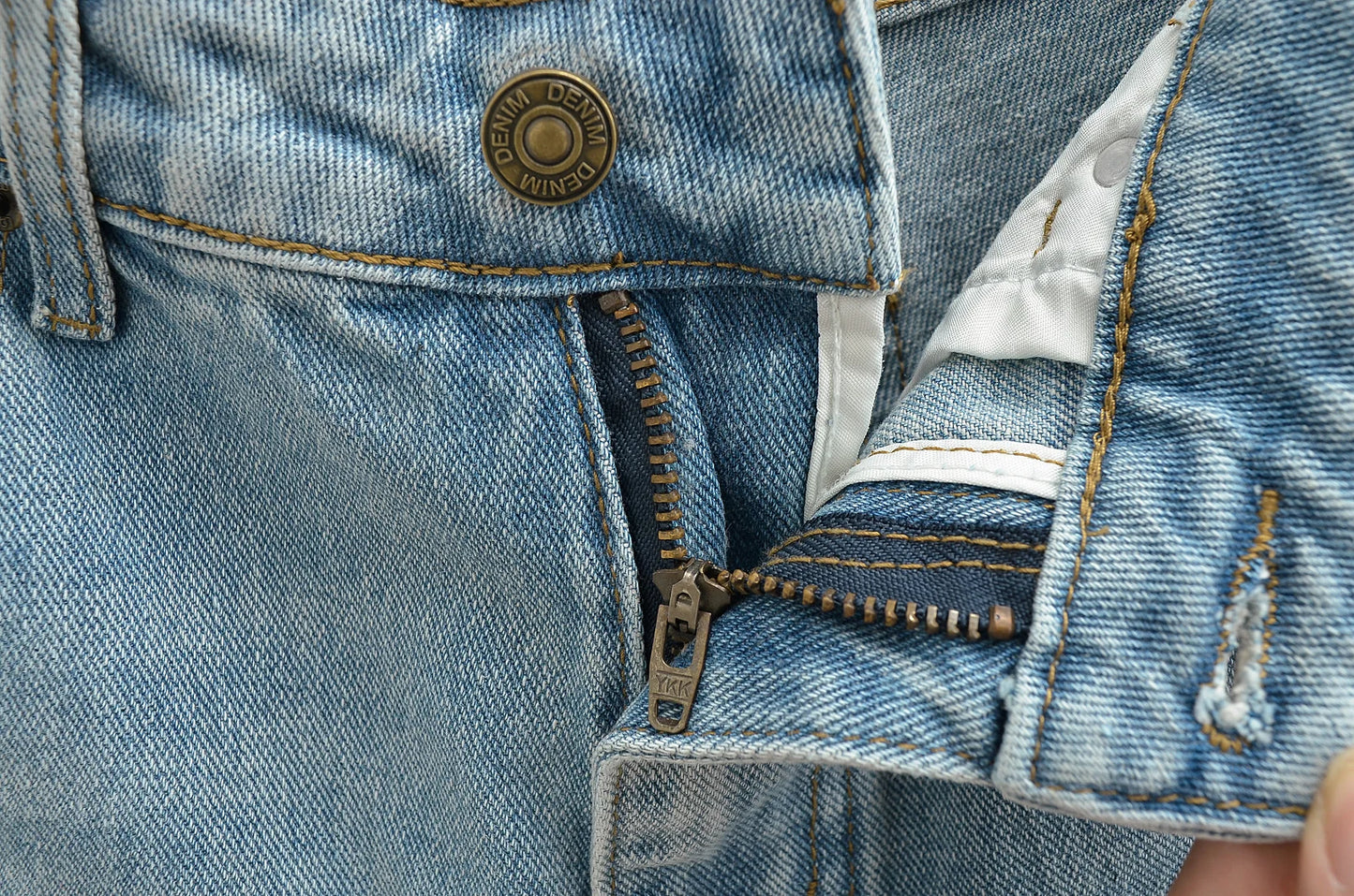 Flared jeans with rips at the knees