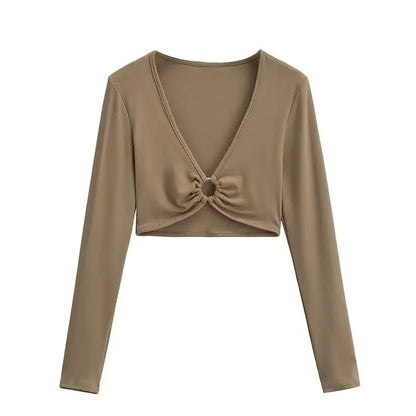 Long shirt with a ring at the neckline