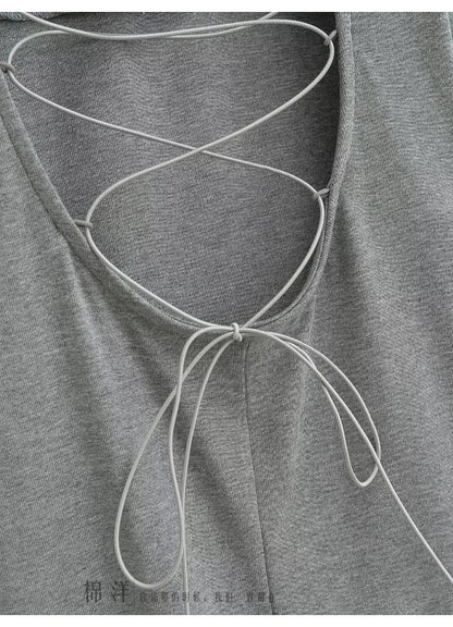 A dress with a built-in bra and an open back