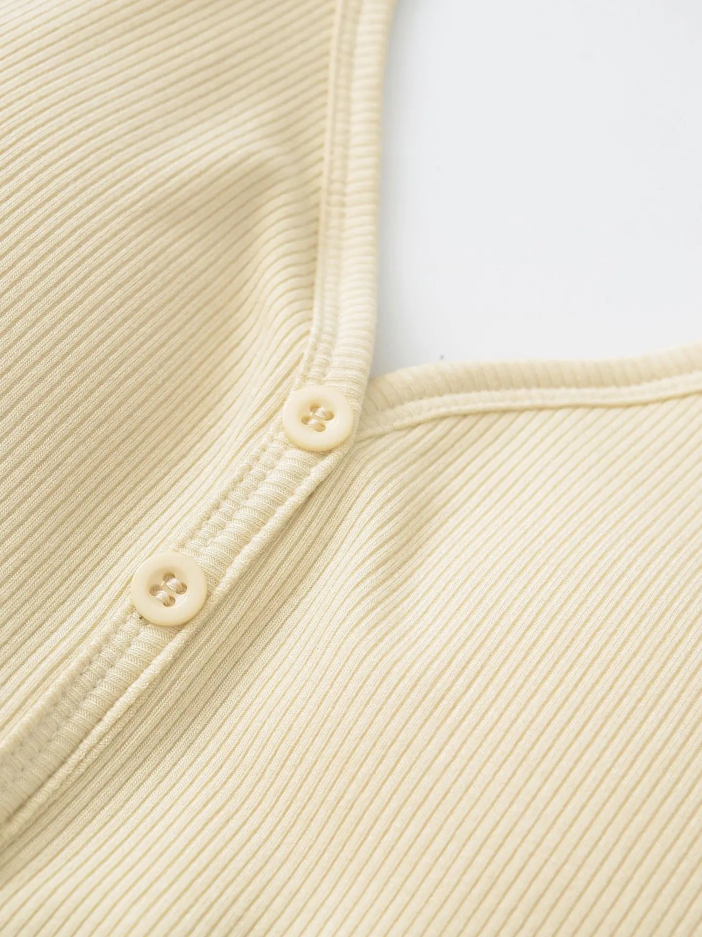 Buttoned collar tank top with a built-in bra