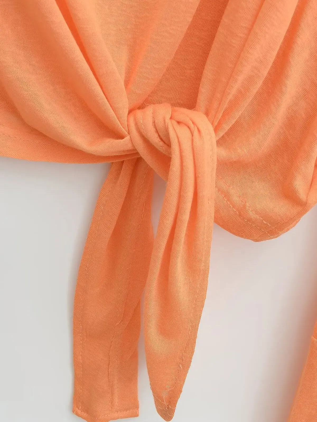 Tie-front top with flared sleeves