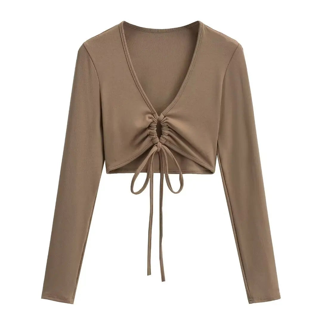 A long shirt with a circle tie in the stomach
