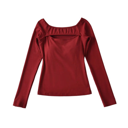 A long shirt with an opening at the neckline and a built-in bra