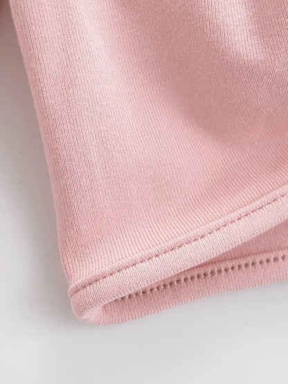 Long shirt with a ring at the neckline