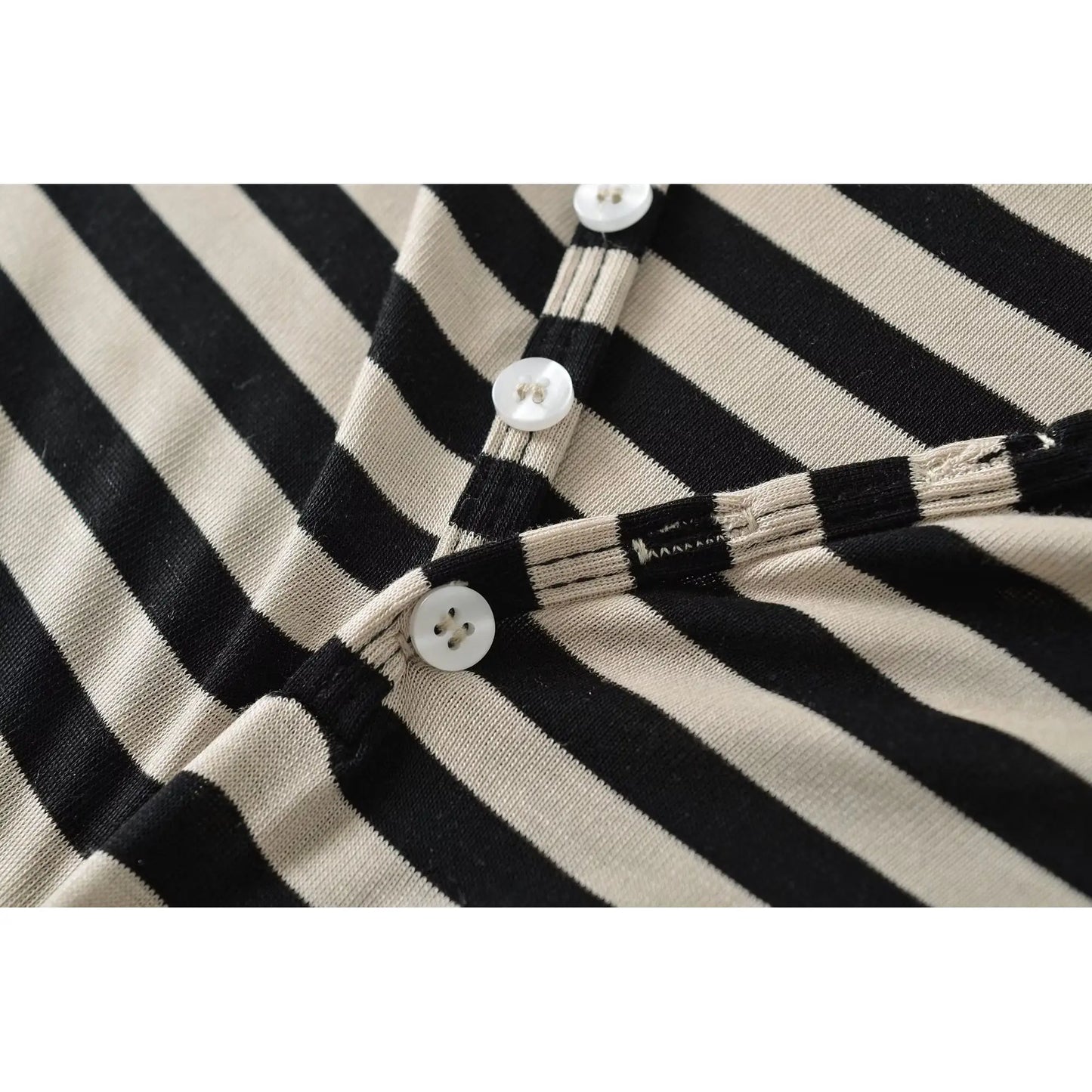 Striped shirt with open half buttons