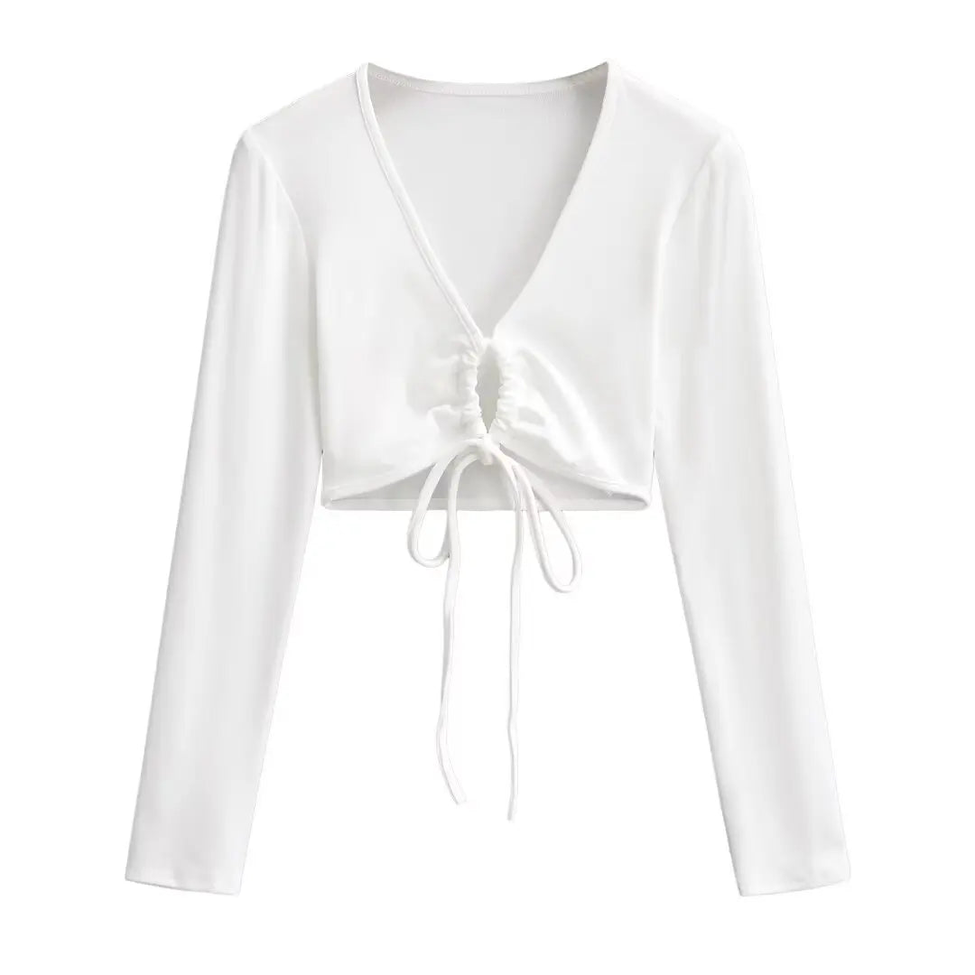 A long shirt with a circle tie in the stomach