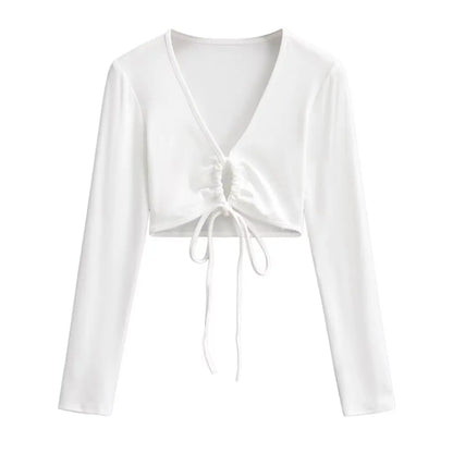 A long shirt with a circle tie in the stomach
