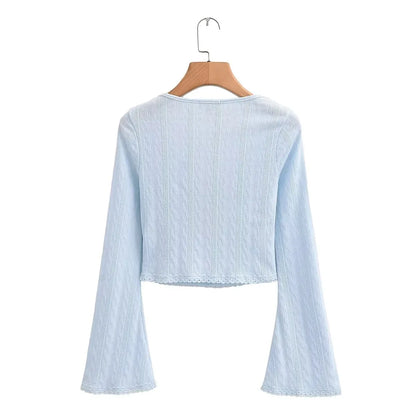 Aesthetic shirt with a tie in the chest and lace decorations