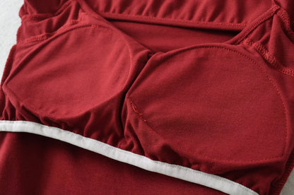 A long shirt with an opening at the neckline and a built-in bra