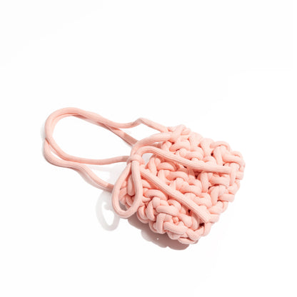 Soft knitted bag with bow tie