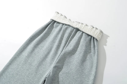 Sweatpants with folded rubber