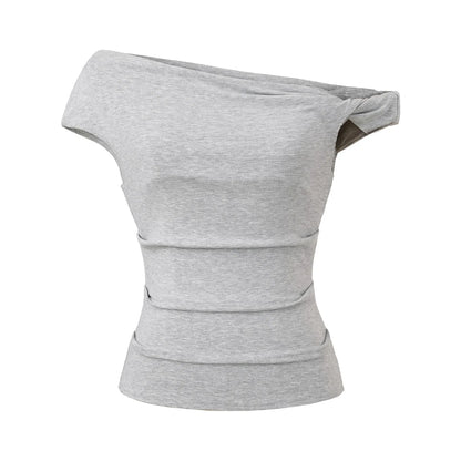 A shirt with a falling shoulder and shirring at the waist