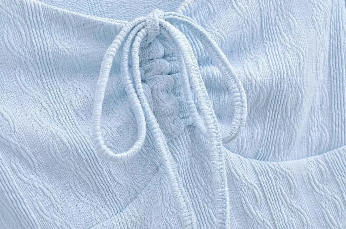 Aesthetic shirt with a tie in the chest and lace decorations