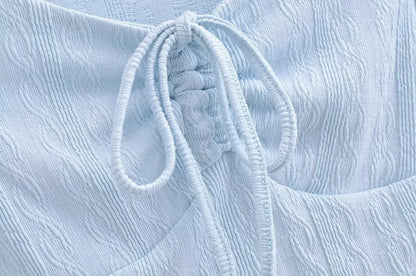 Aesthetic shirt with a tie in the chest and lace decorations
